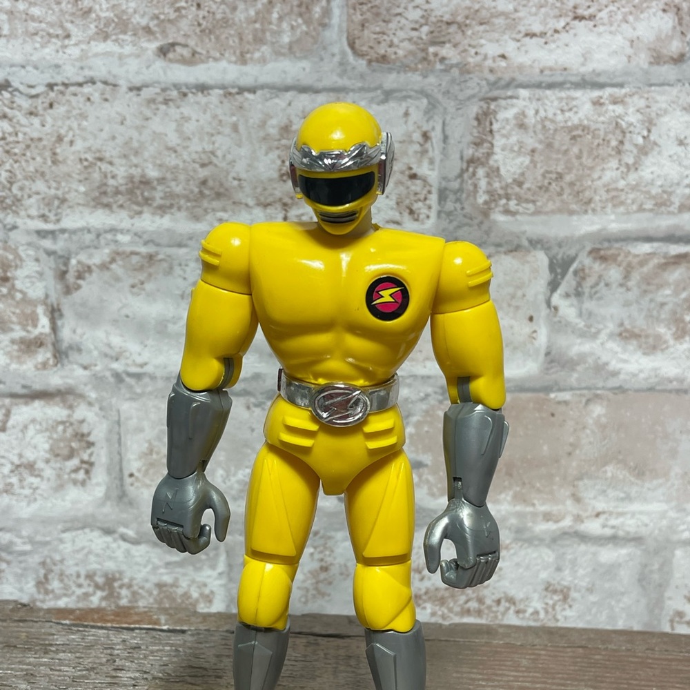 1993 Trendmasters Yellow power ranger figure.